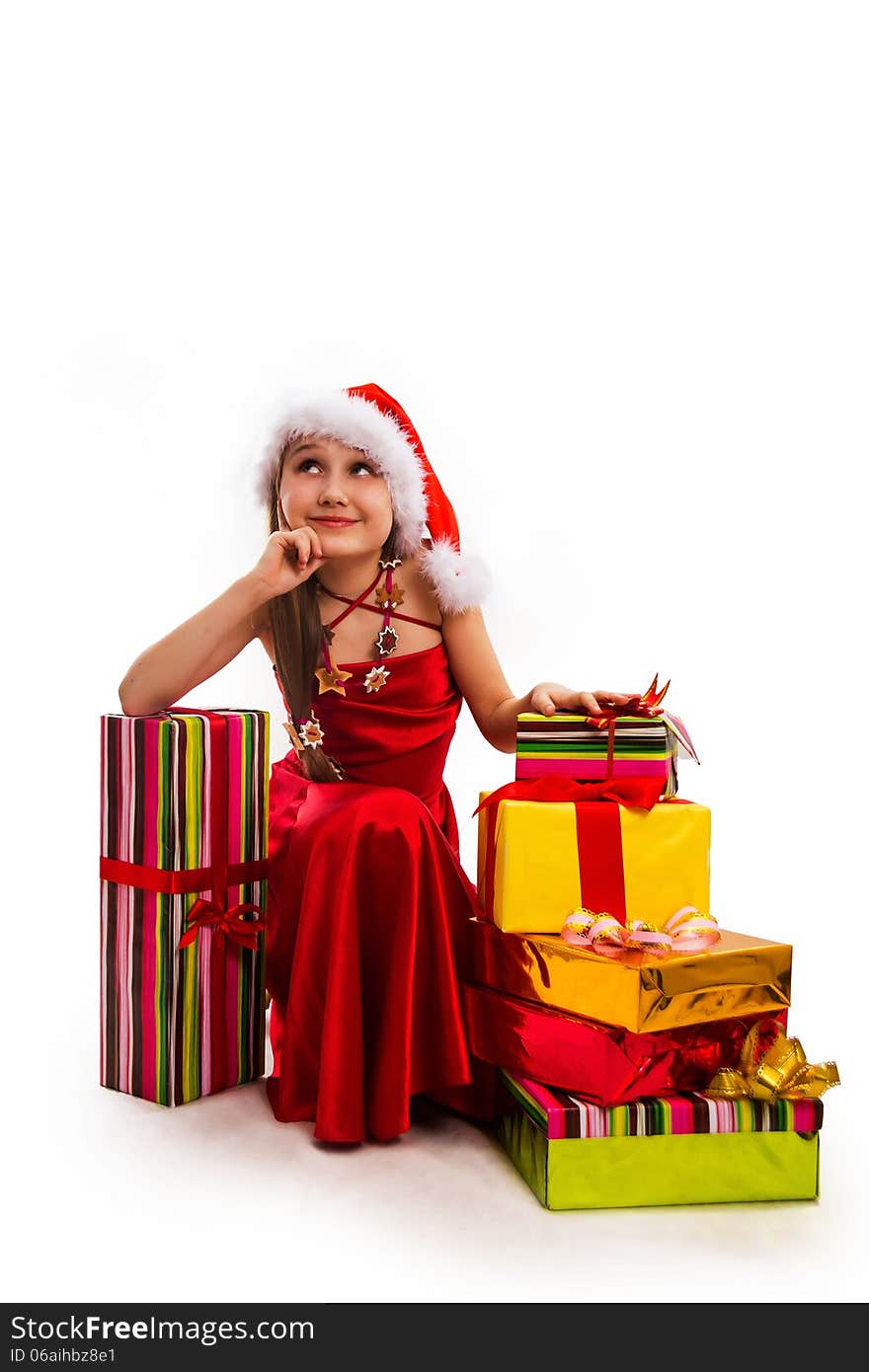 Christmas gifts and small girl Santa. Christmas gifts and small girl Santa