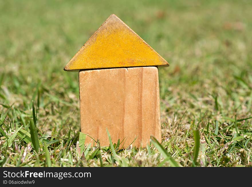 Old houses on green grass