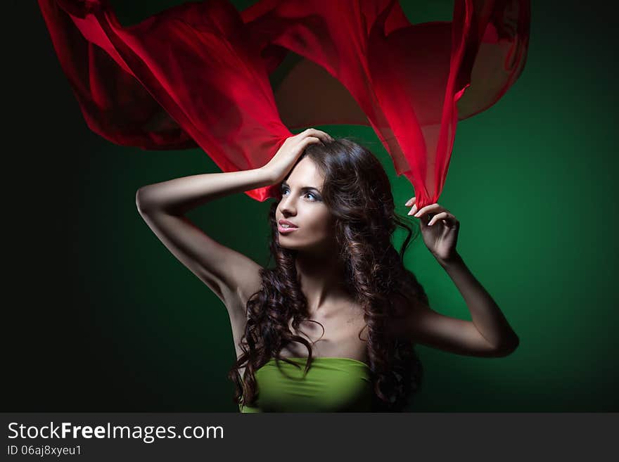 Long curly hair smiling girl with hands up. Long curly hair smiling girl with hands up