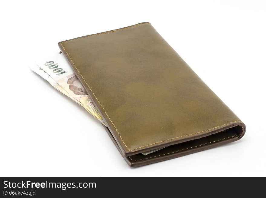 Thai banknote in brown wallet isolated on white background