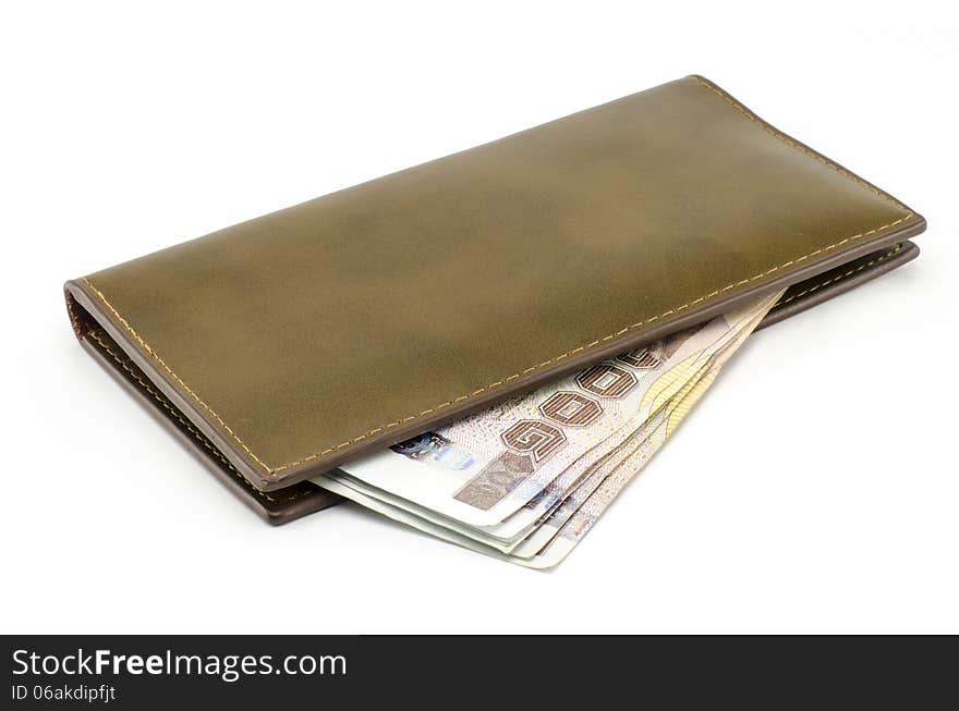 Thai banknote in brown wallet isolated on white background