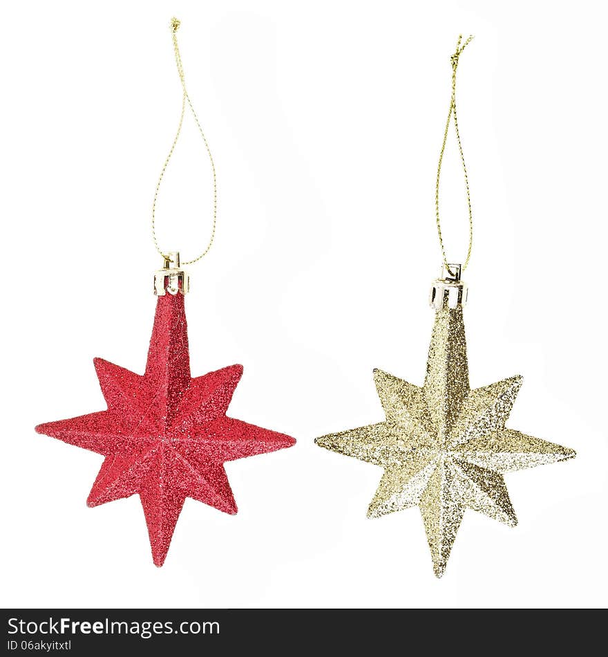 Gold and red eight pointed star christmas decoration for hanging on tree. Gold and red eight pointed star christmas decoration for hanging on tree