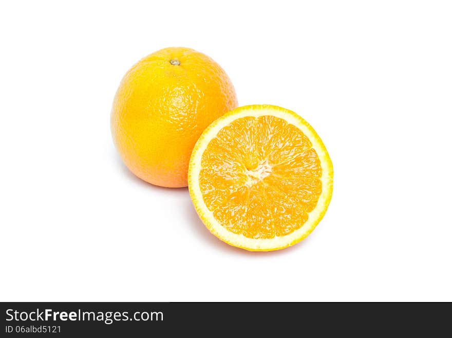 Orange fruit and half orange fruit on white background