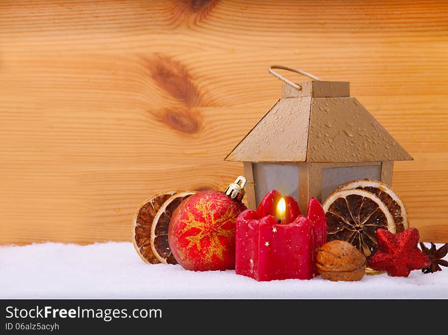 Red Christmas Candle and latern. Christmas decoration and snow. Red Christmas Candle and latern. Christmas decoration and snow.