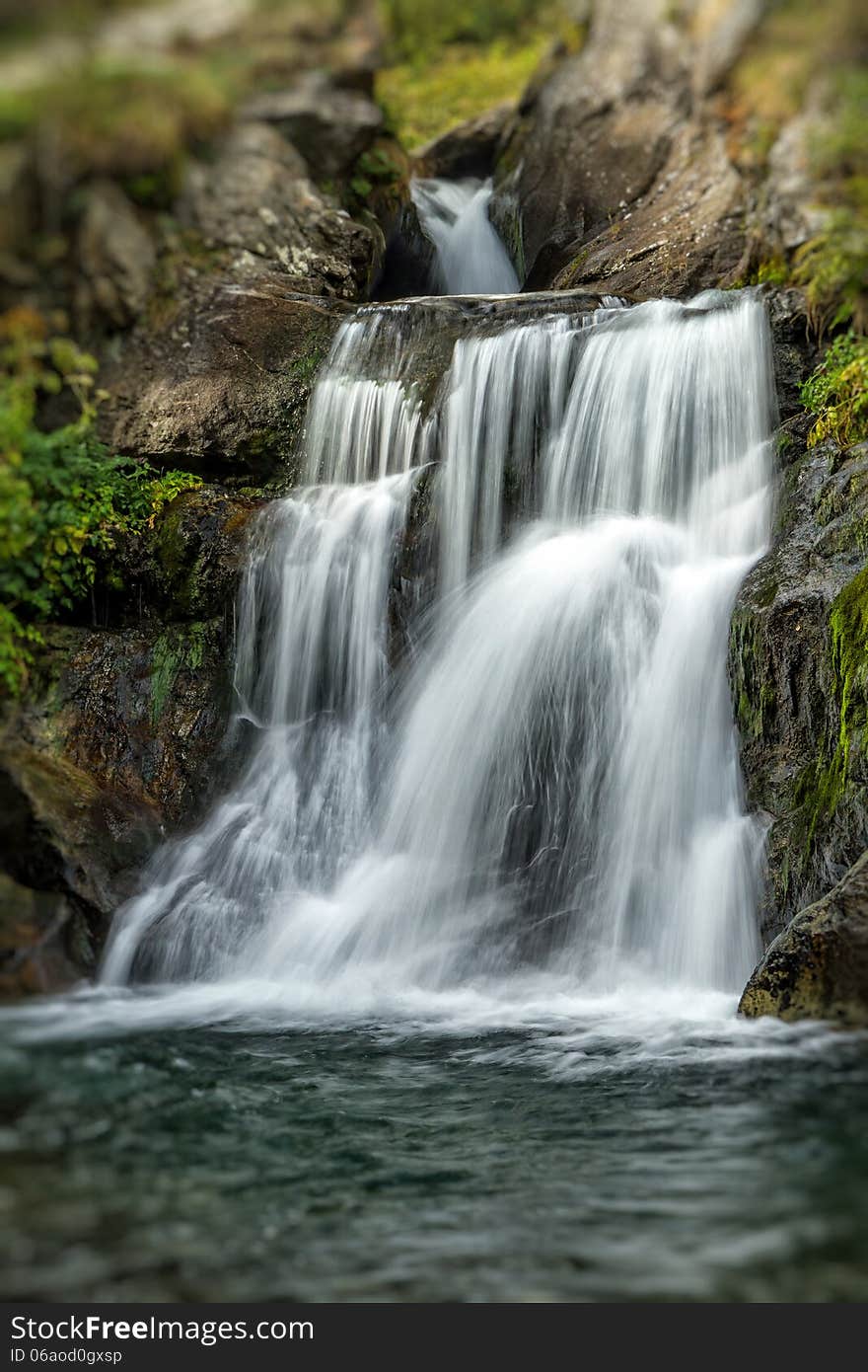 Beautiful veil cascading waterfalls, mossy rocks