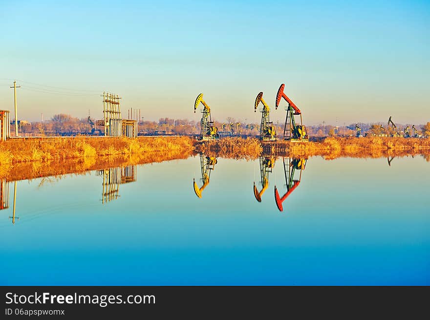 The oil sucking machine and inverted image sunrise