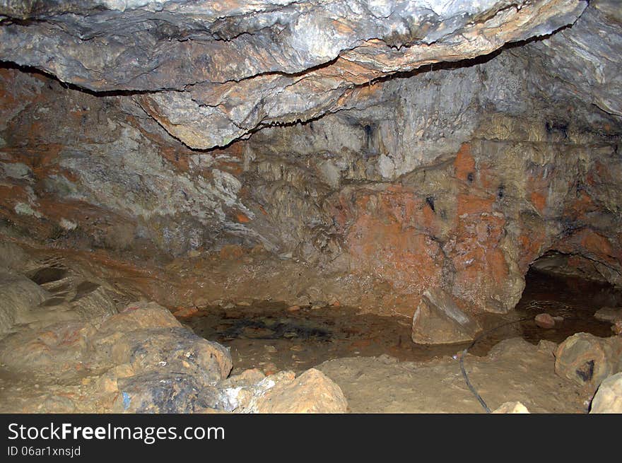 Picture taken in the cave of Zoodochou Pygis above Kamari in Santorini,Greece.Here is the only natural water source on the island. Picture taken in the cave of Zoodochou Pygis above Kamari in Santorini,Greece.Here is the only natural water source on the island.