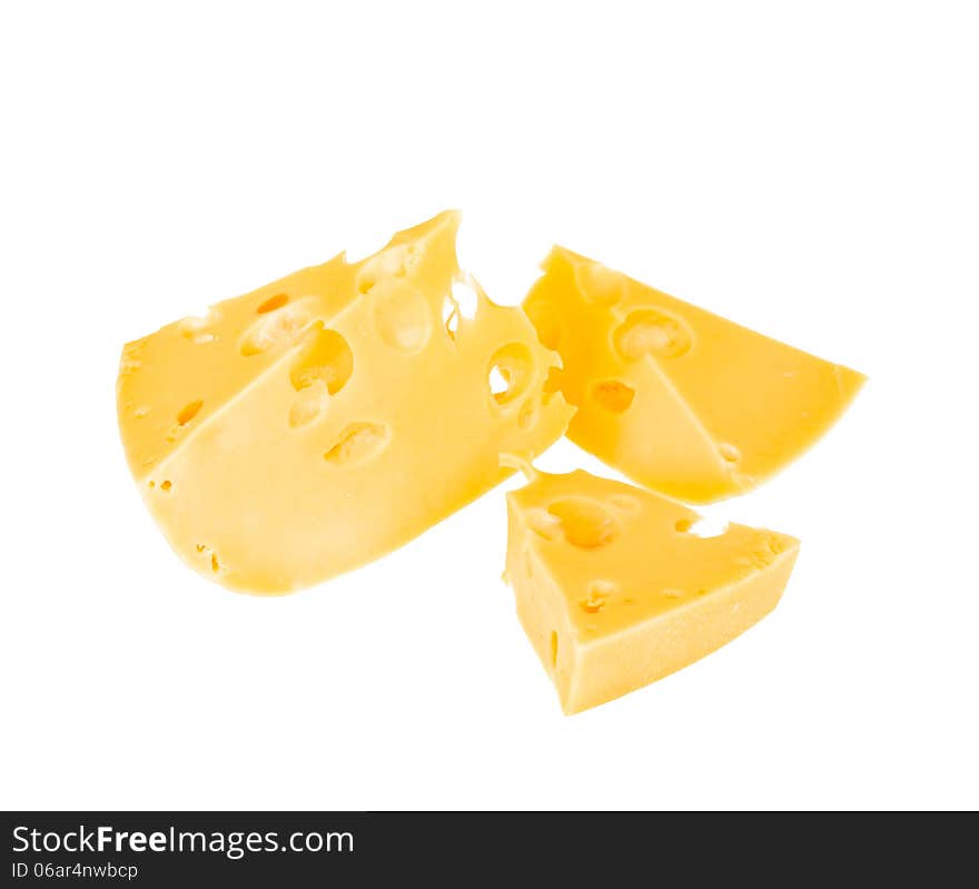 Three Pieces Of Yellow Cheese With Holes