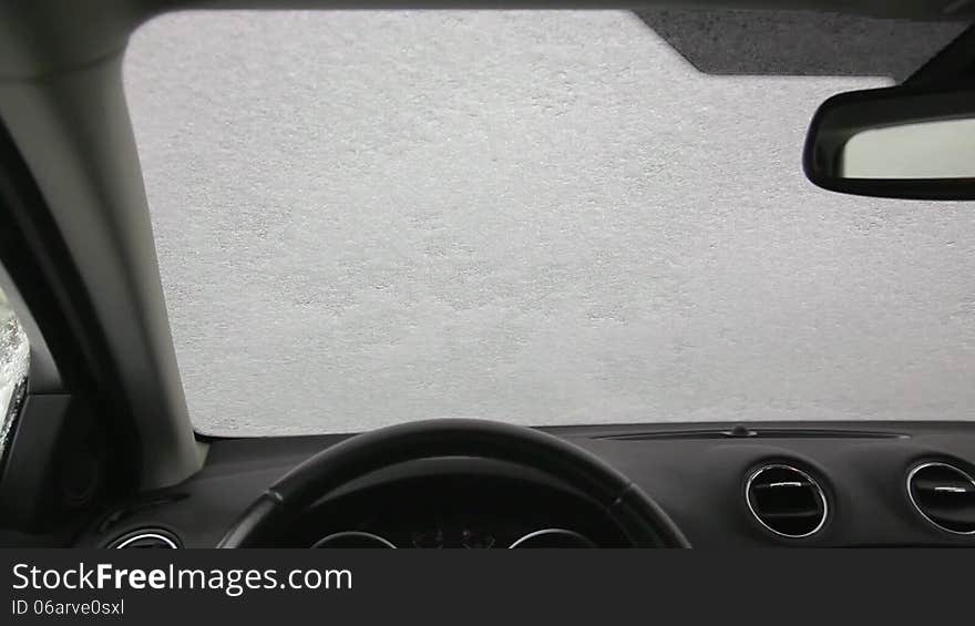 Scraping The Ice Of A Car Windshield 1080p