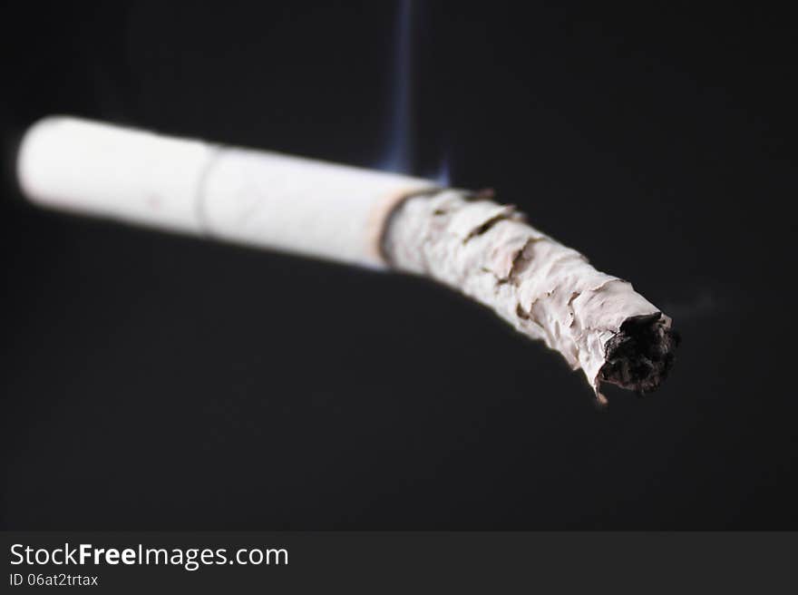 Cigarette on a dark background