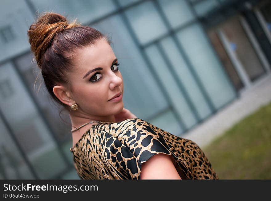 Beautiful young woman on the city, model with her back. Beautiful young woman on the city, model with her back