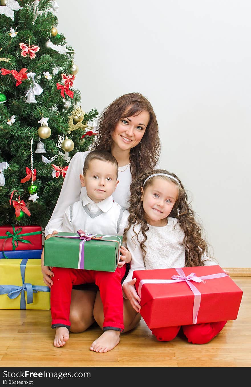 Happy family. Mother, son and daughter together.