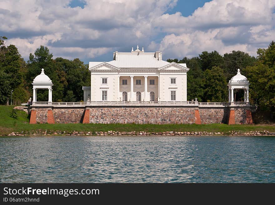 Tyshkevich Palace near Galve lake in Trakai, Lithuania on a beautiful summer day. Tyshkevich Palace near Galve lake in Trakai, Lithuania on a beautiful summer day.