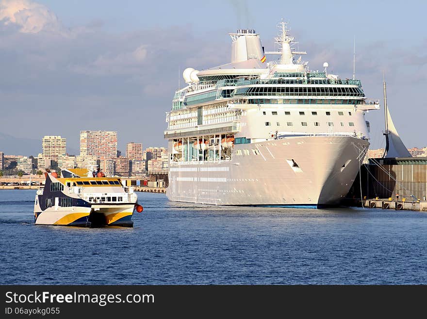 Modern cruise and touristic ferry in Alicante harbor