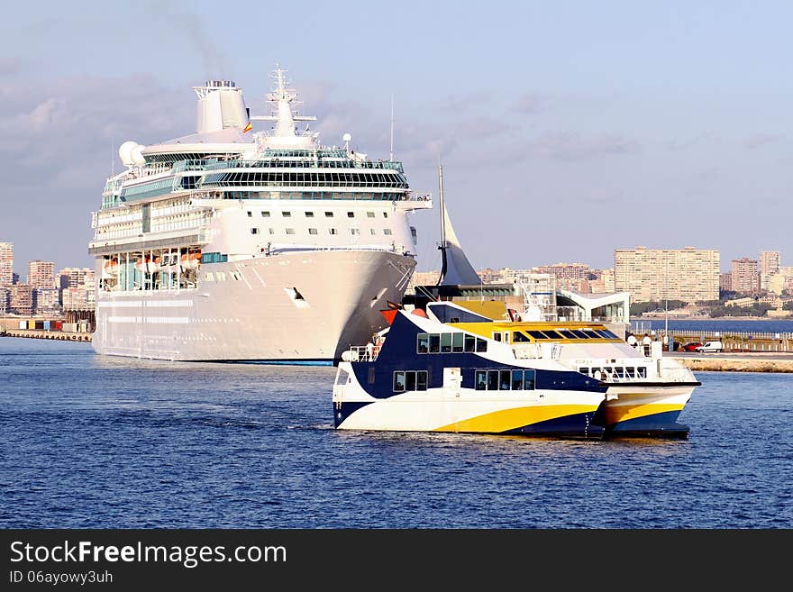 Modern cruise and touristic ferry in Alicante harbor