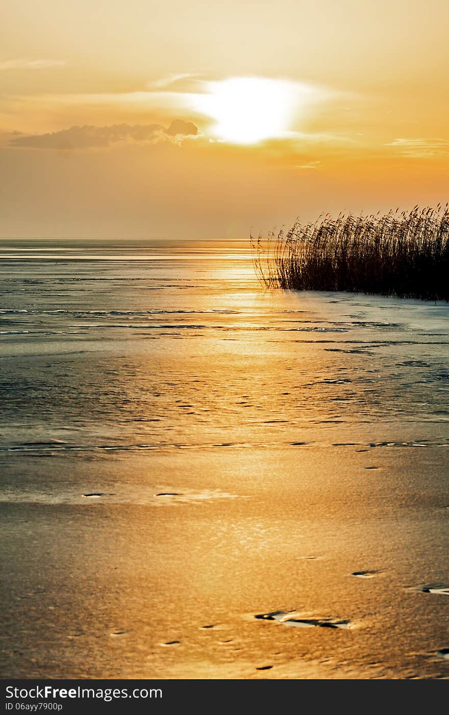 Sunset in winter from a froze lake (lake Balaton,HUngary)