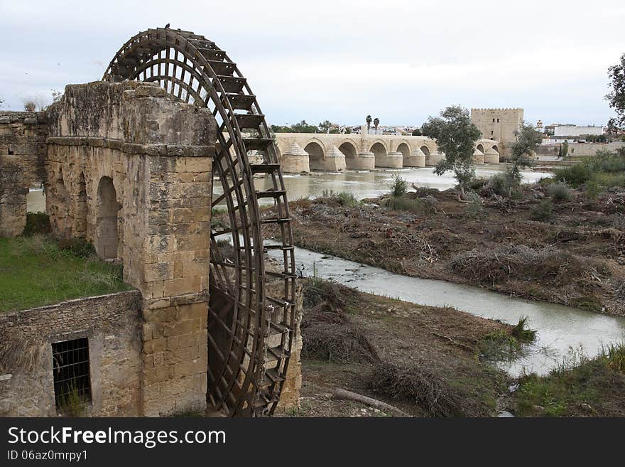 Ancient water mill on gloomy autumn landscape. Cordoba, Spain. Ancient water mill on gloomy autumn landscape. Cordoba, Spain