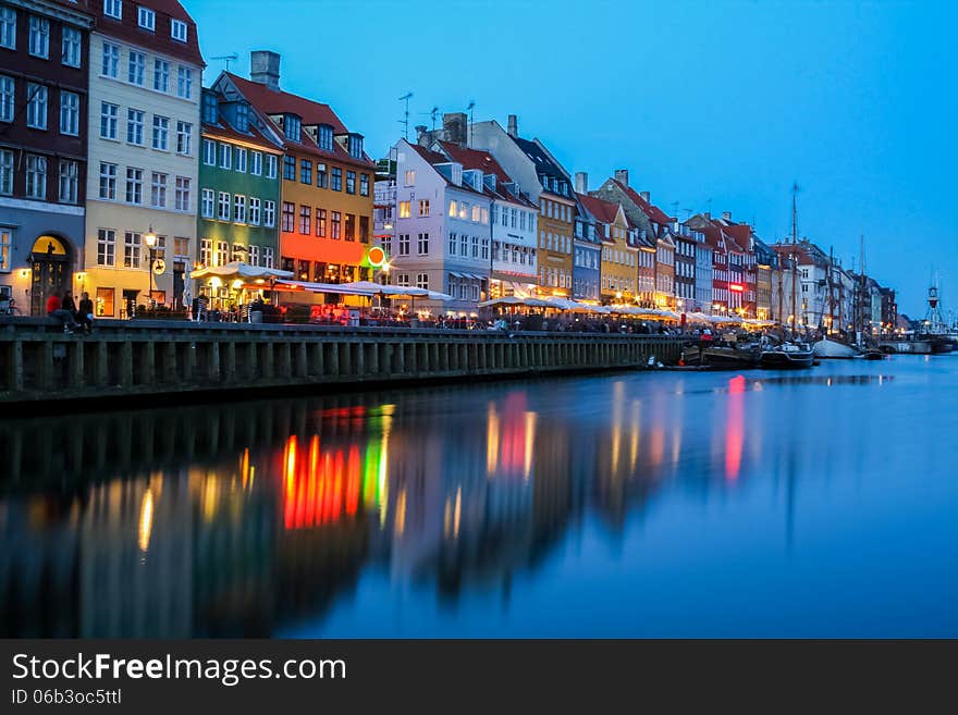 Evening lights over the Nyhavn street, Copenhagen Denmark. Evening lights over the Nyhavn street, Copenhagen Denmark