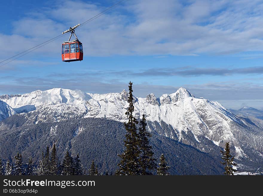 Ski lift chairs on bright winter day