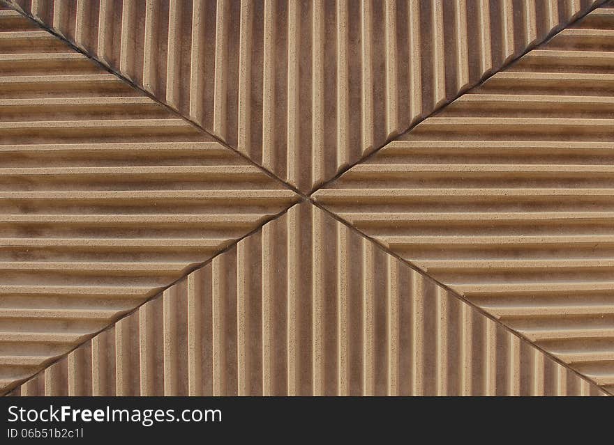 Detail of facade with undulated stone tiles, architectural background design