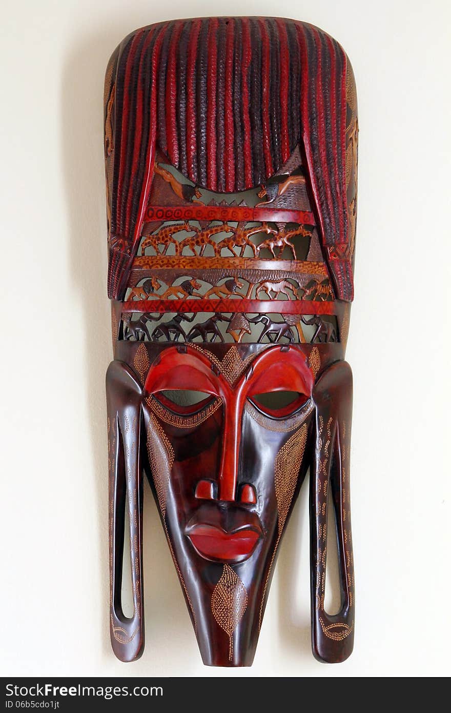 Decorated hand made african wooden mask. Decorated hand made african wooden mask