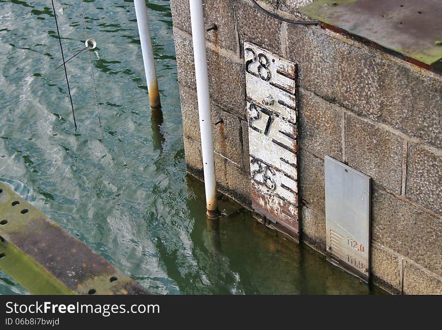 Water level indication on the marina barrage dam in Singapore, very much similar to the purpose of a plimsoll line on a ship. Water level indication on the marina barrage dam in Singapore, very much similar to the purpose of a plimsoll line on a ship.