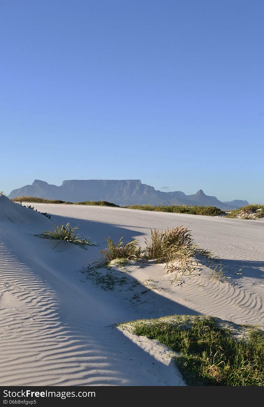 Landscape with sand dune and Table Mountain