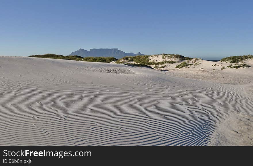 Landscape with sand dune and Table Mountain