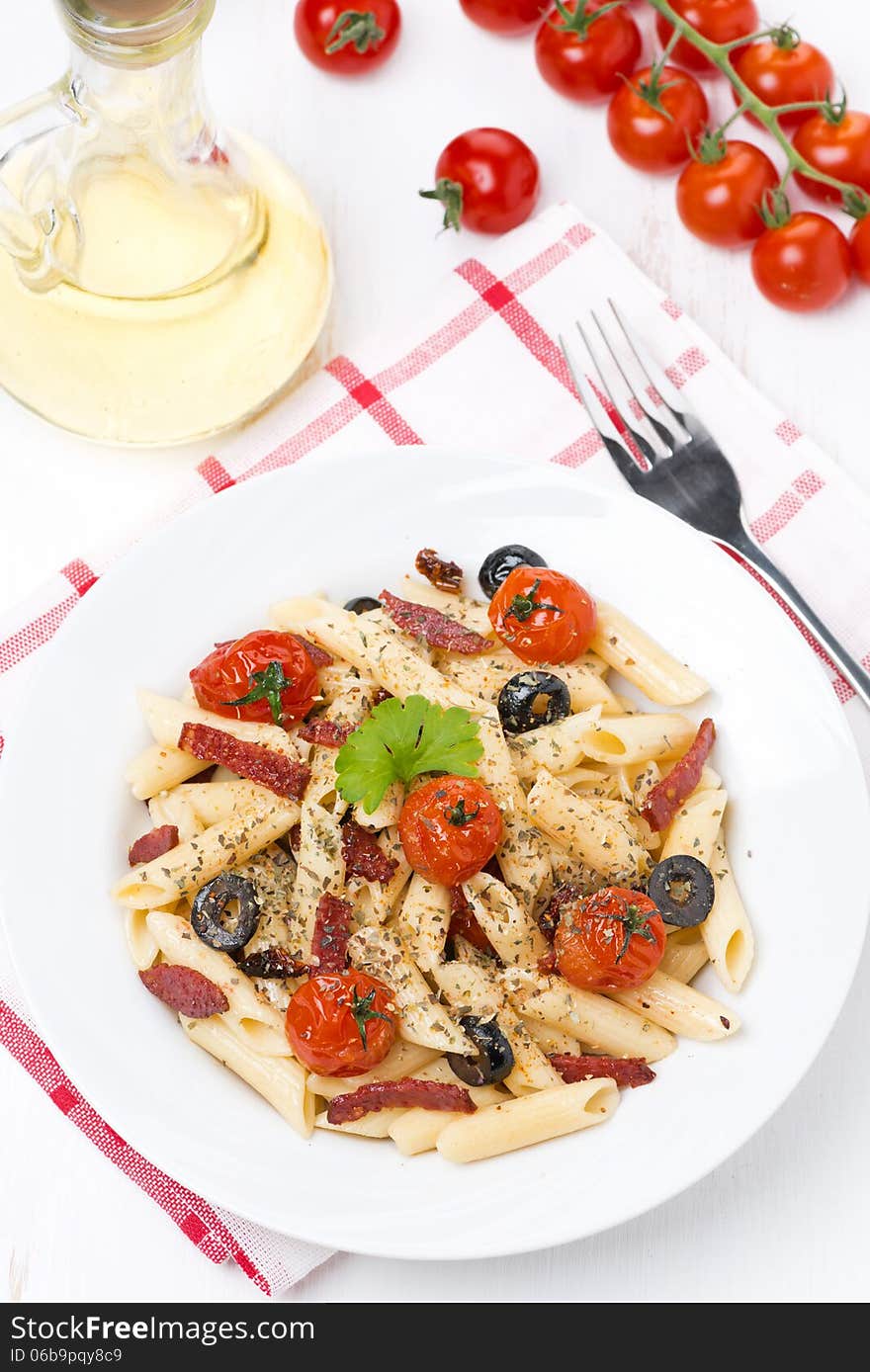 Pasta With Sausage, Cherry Tomatoes And Olives, Top View