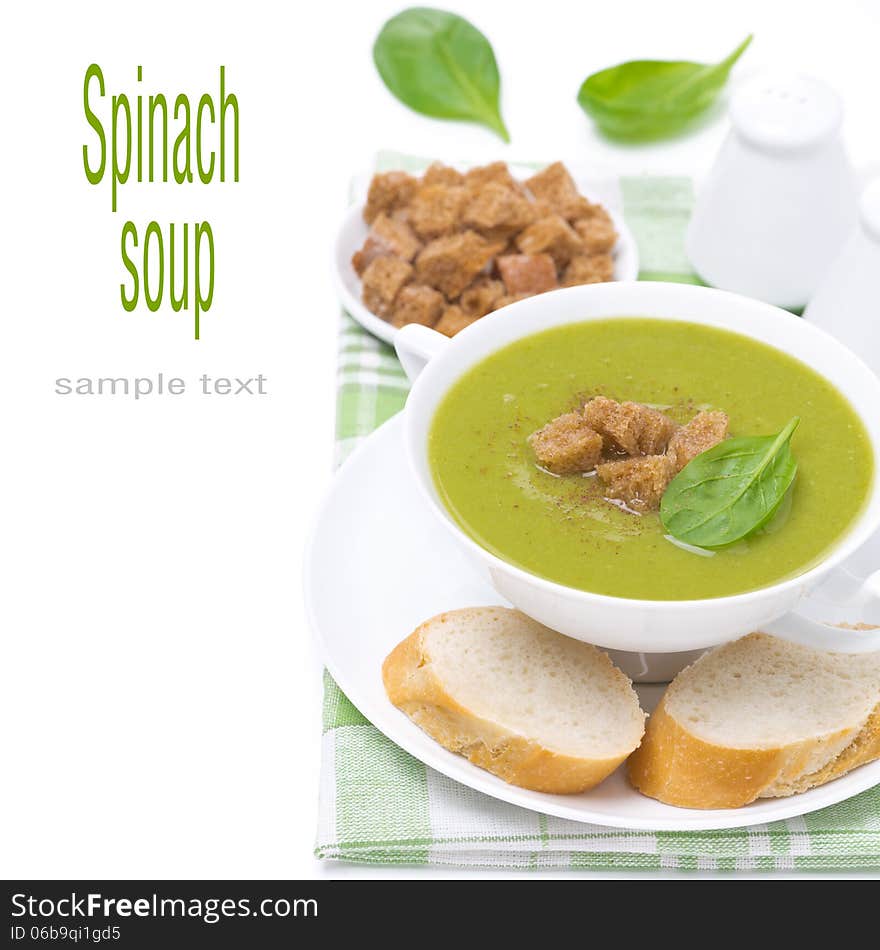 Spinach soup with croutons, isolated