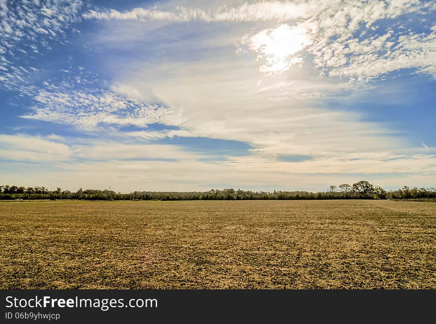 Sunset Over Farm Field