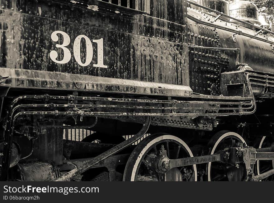 Old black locomotive engine details