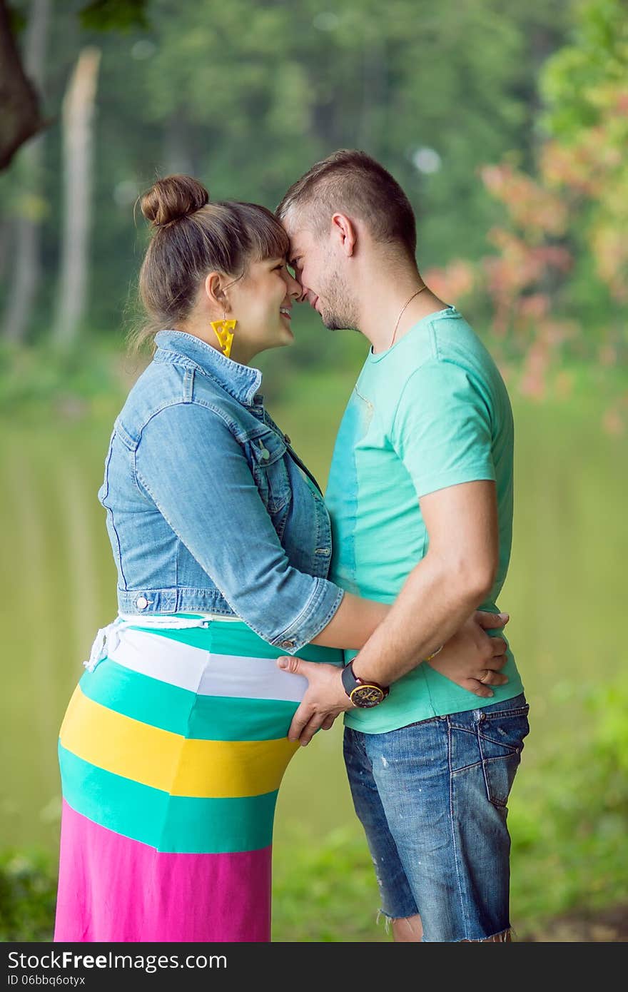 Happy family couple in anticipation of the birth of a baby. Happy family couple in anticipation of the birth of a baby