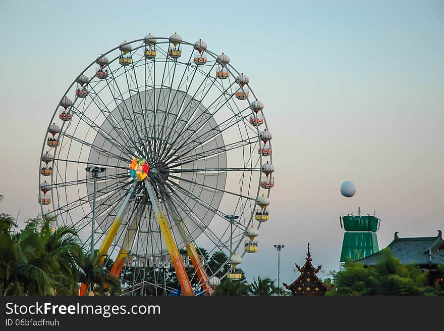 The ferris wheel in the amusement park in Thailand.