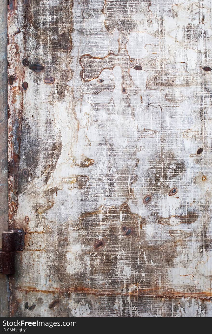 Old Shabby Metal Door with traces from welding, background