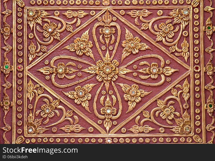 Pattern stucco gold red temple wall background