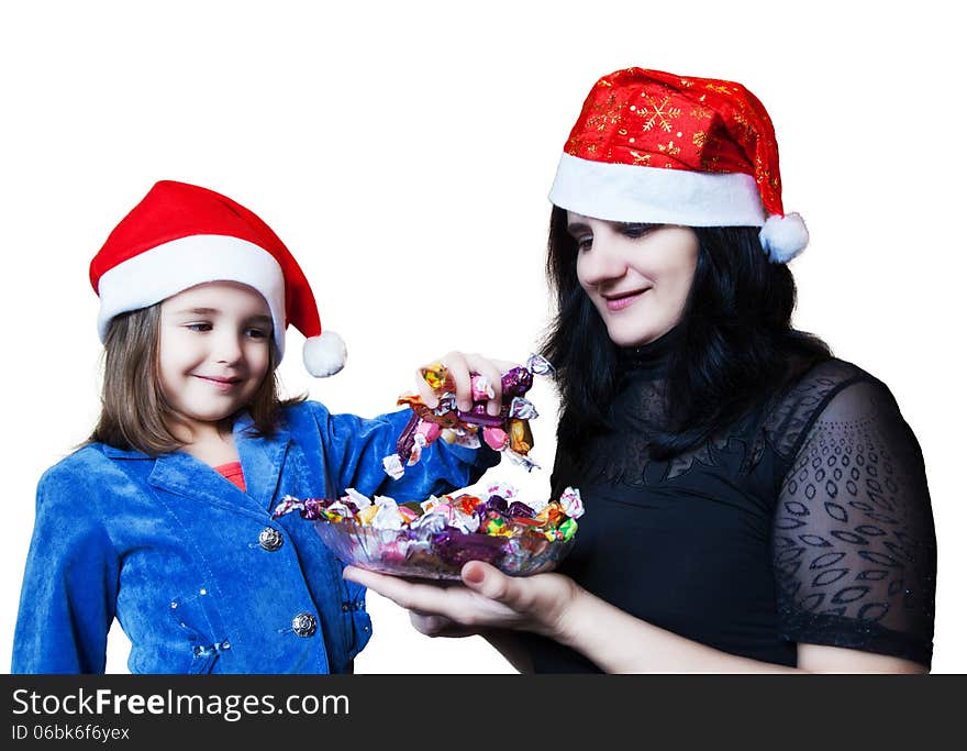 Mom treats her daughter candy in Christmas