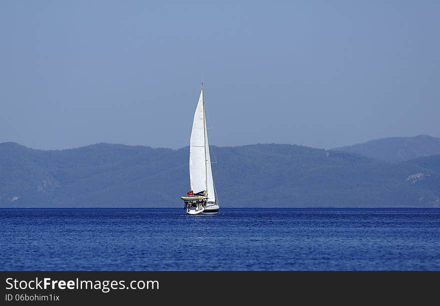 A sailboat in the Mediterranean. A sailboat in the Mediterranean