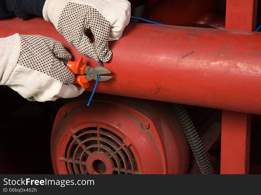 Maintenance worker at work with a machine