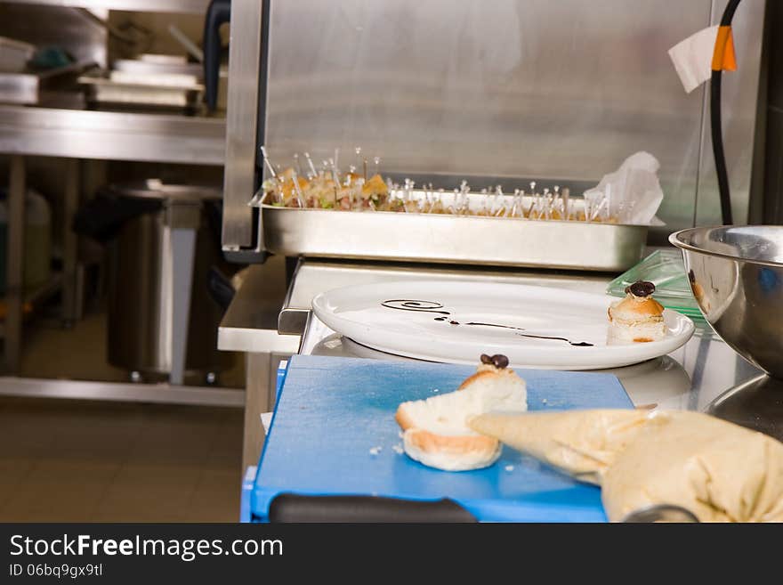 Cook preparing sweets for the customer tables