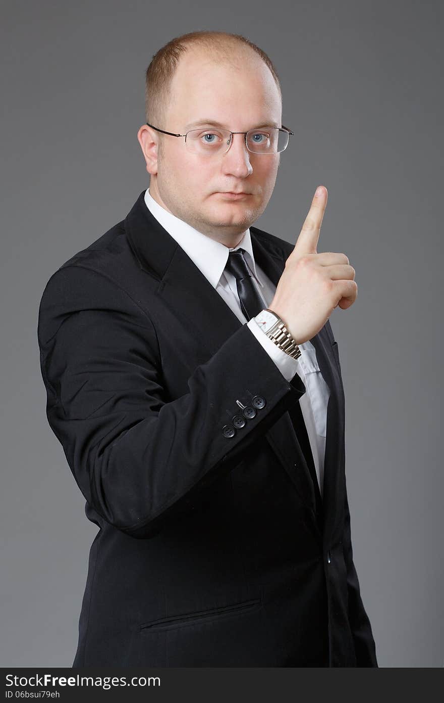 Businessman showing sign of attentions