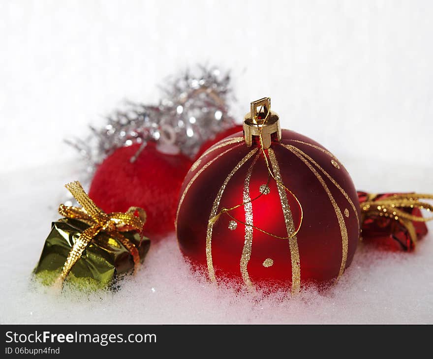 Christmas ornaments over a white background. Christmas ornaments over a white background