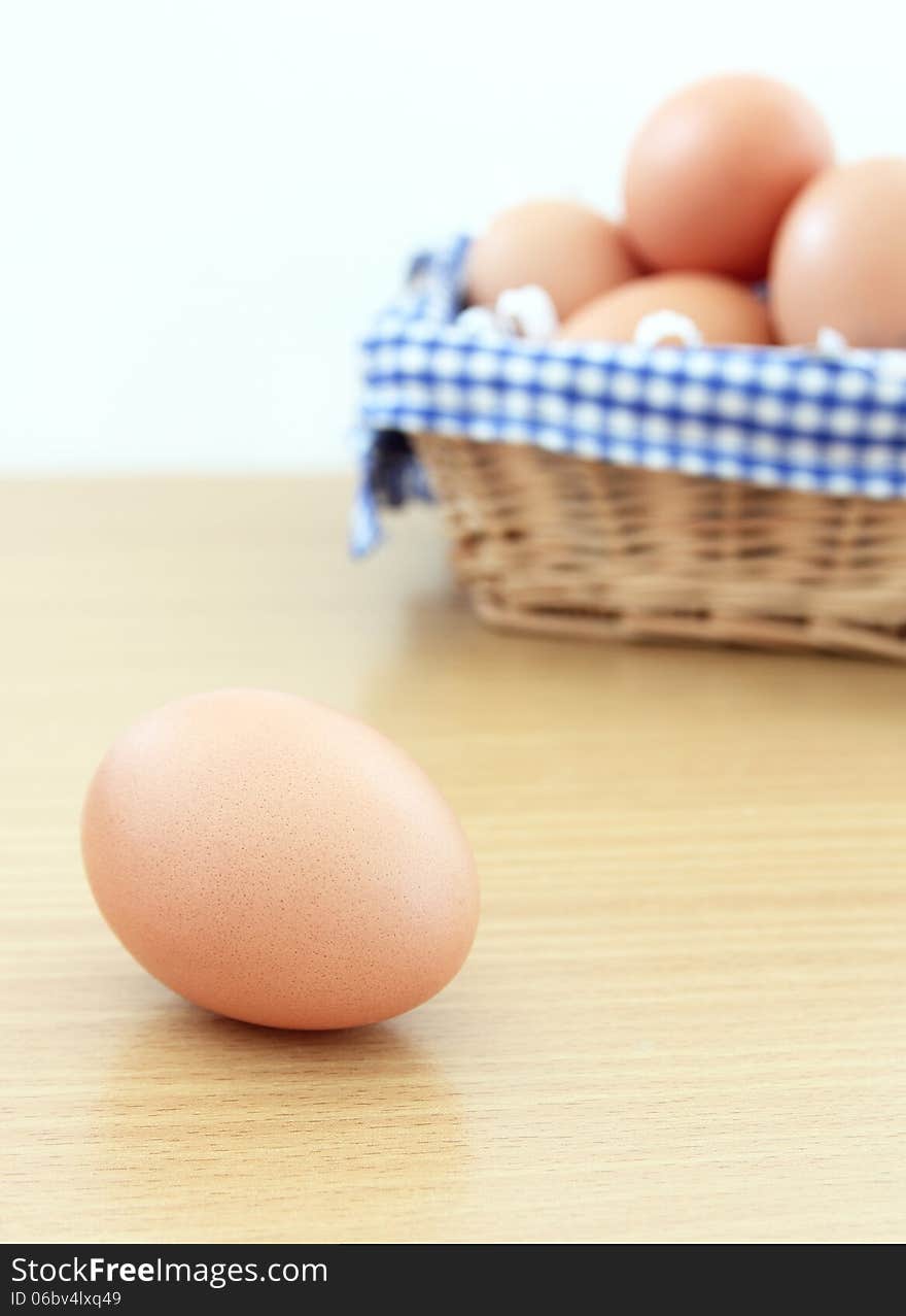 Brown eggs on table.