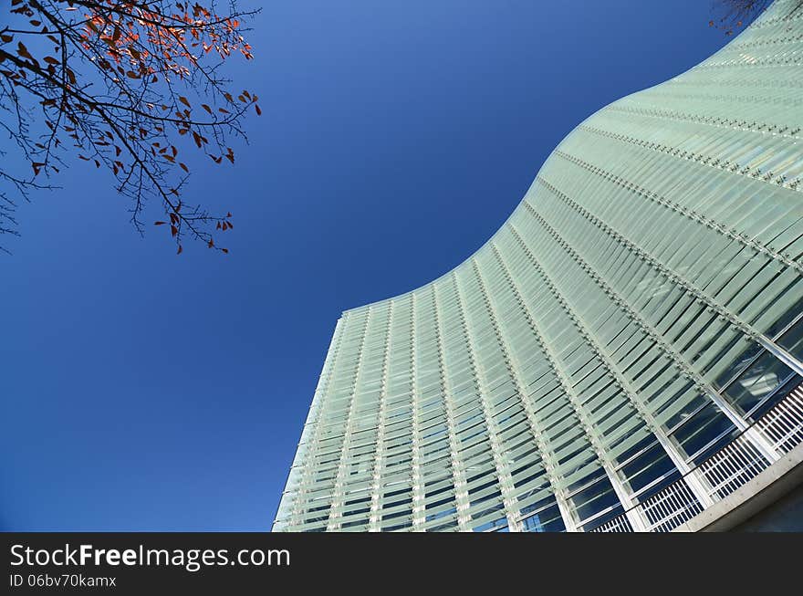 Facade - shapes from a modern building, with structural lines reflection