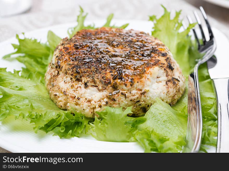 Baked homemade cheese, close-up