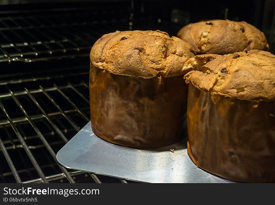 3 Loaves of Delicious Panettone coming out of oven. 3 Loaves of Delicious Panettone coming out of oven