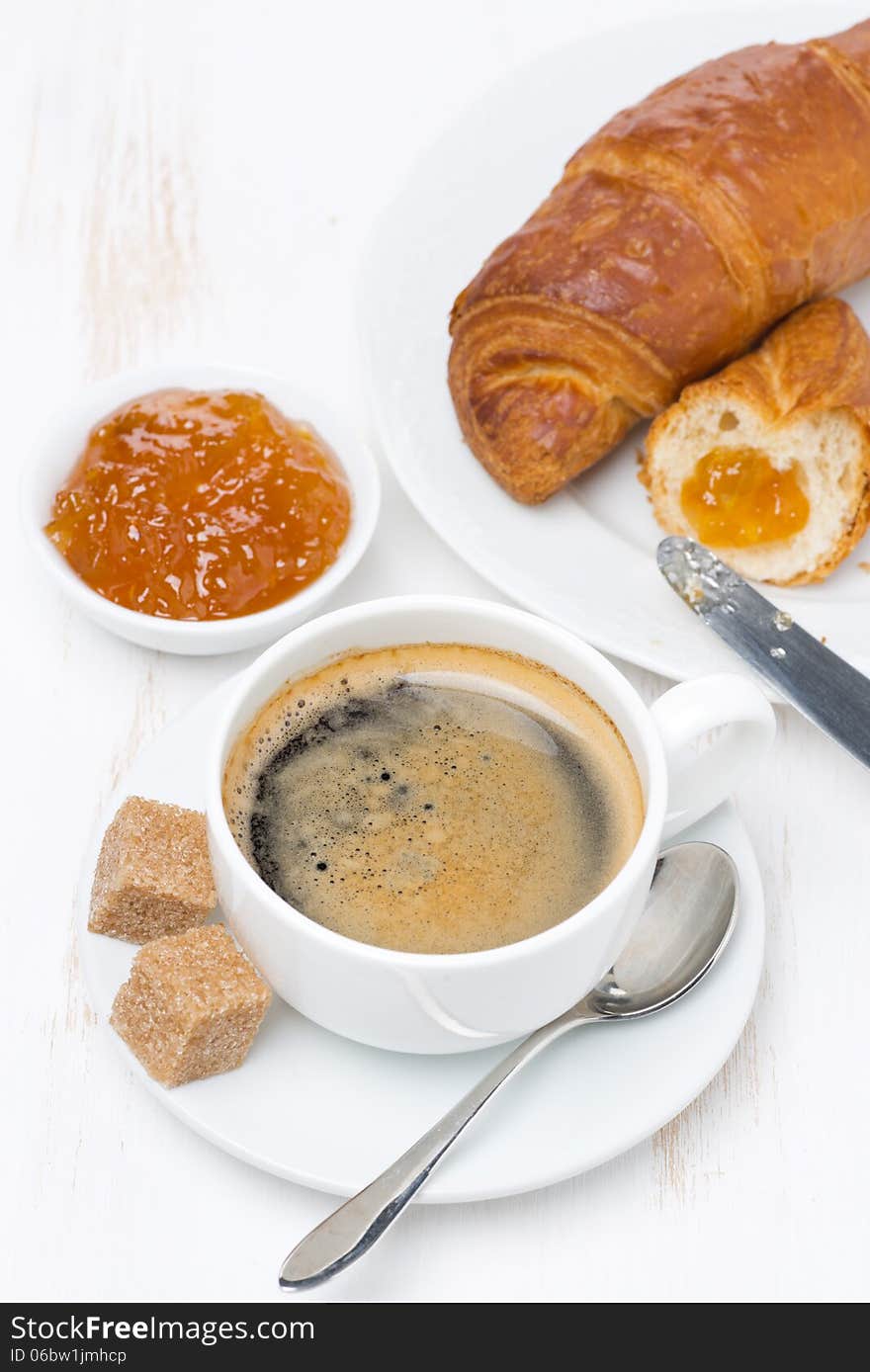 Fresh Breakfast With Black Coffee, Croissants And Orange Jam