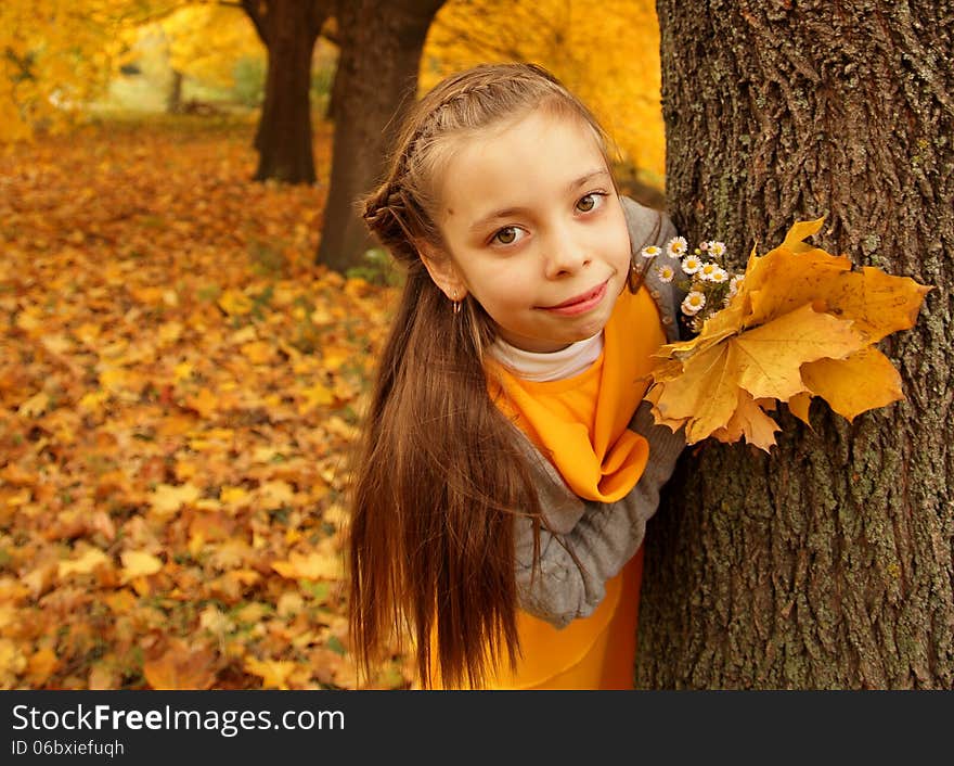 Beautiful girl playing in nature