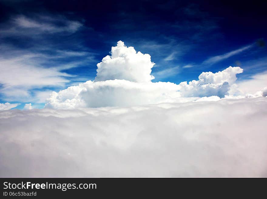 On a plane travel to Shenzhen, the plane triumph in the sky above the clouds, the heaven looks so fantastic, blue and clean. On a plane travel to Shenzhen, the plane triumph in the sky above the clouds, the heaven looks so fantastic, blue and clean