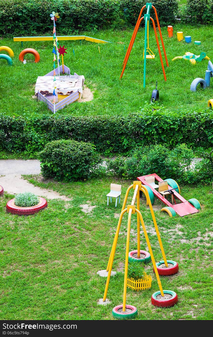 Playground for children in the garden on a sunny day